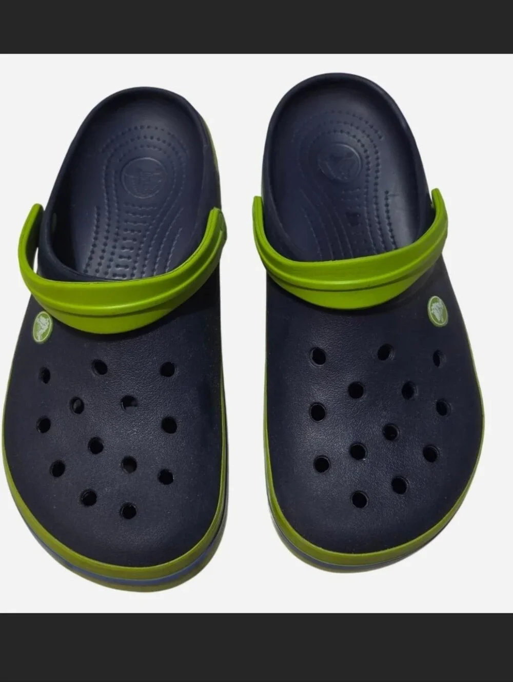 Crocs Crocband Clogs in the Navy Blue/Volt Lime Green colorway